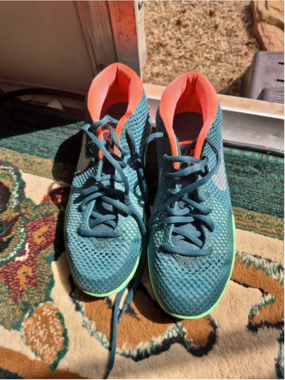 Nike Kyrie Irving(youth sz 5) women's Sz7. Emerald green/ orange in GUC. (#1764)